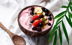 Açaí berries bowl with fresh fruit and granola