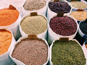Large sacs filled with various beans and legumes, Health Benefits of Beans and Legumes for Energy & Digestion