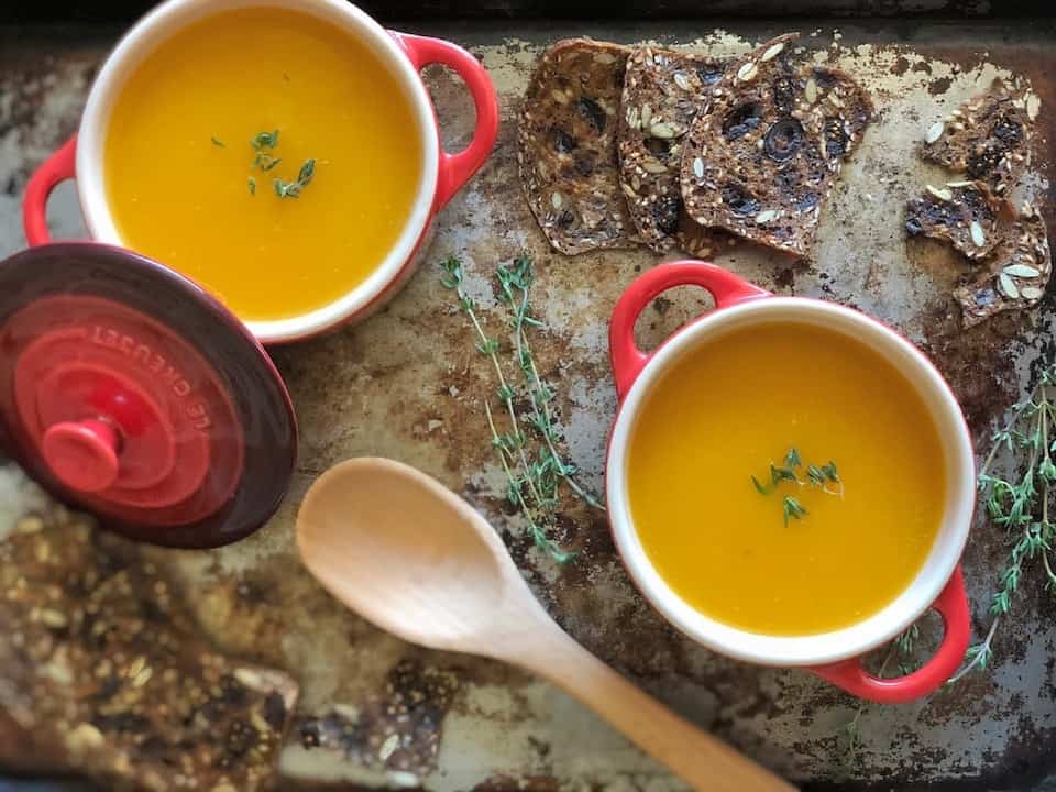 Two small pots filled with homemade miso soup