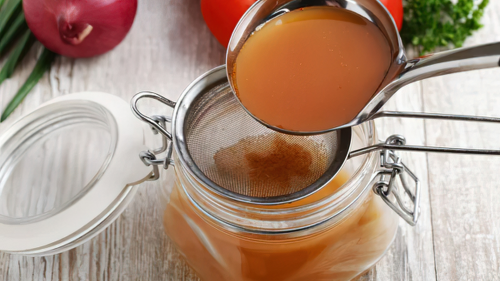 Happy Belly Health, Shanti Pappas, How to Make Bone Broth, Homemade bone broth stored in jars