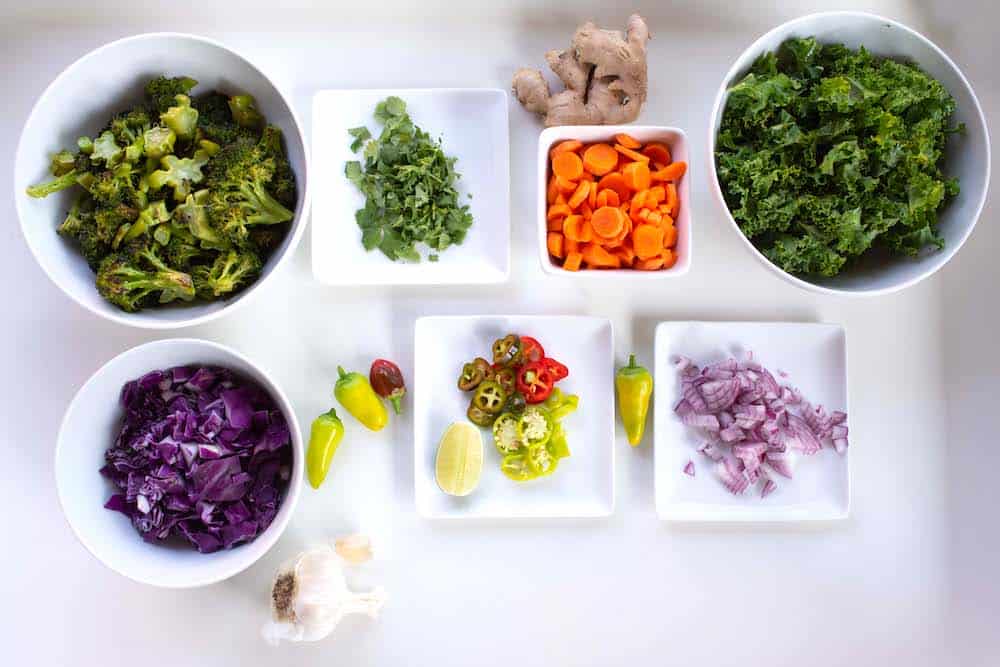 Spread of vegetables and salad toppings